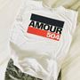 "AMOUR 504" Ladies' Flowy Muscle Tee with Rolled Cuff